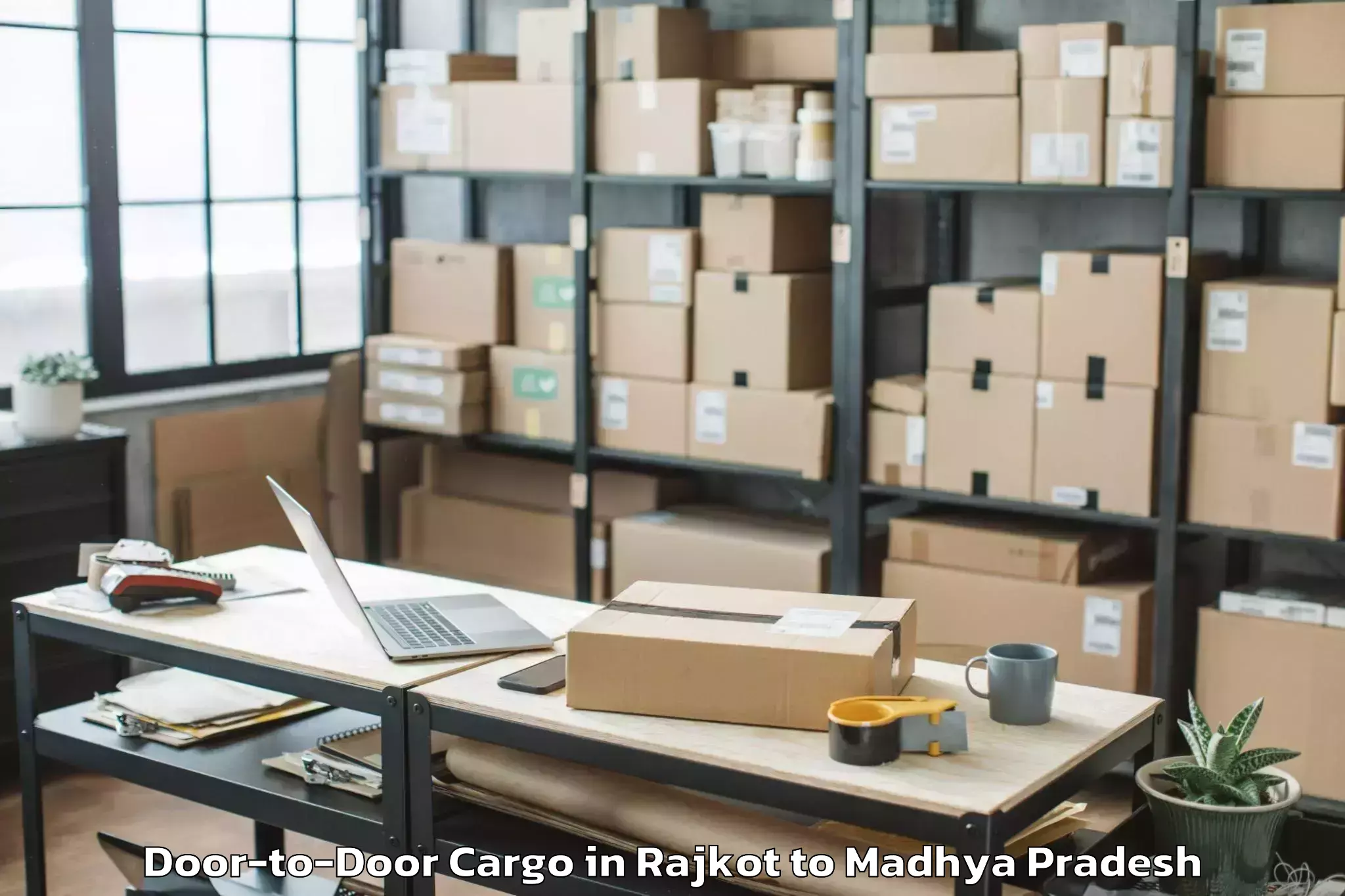 Hassle-Free Rajkot to Malwanchal University Indore Door To Door Cargo